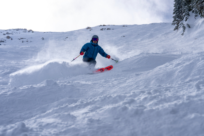 skier on mogul ungroomed run 