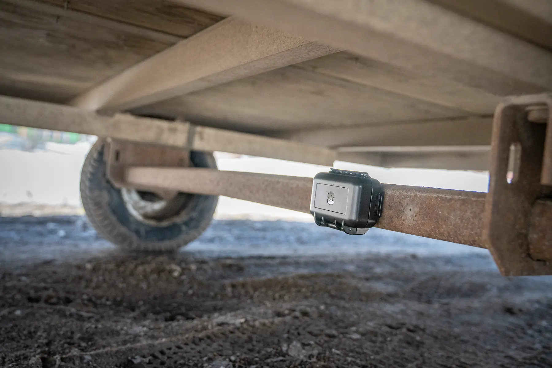 gps tracker attached to carriage of vehicle