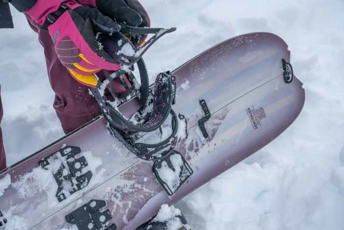 sliding a splitboard binding on