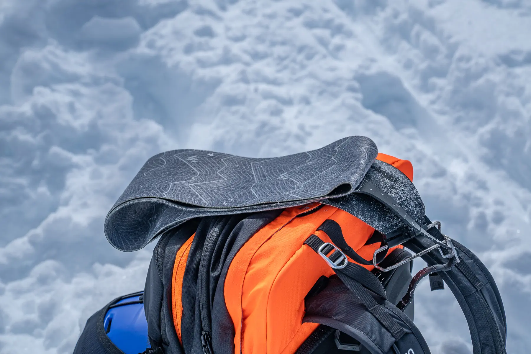 splitboarding skins on top of backpack
