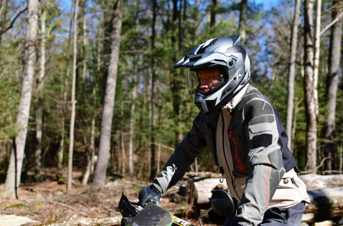 moto rider standing in pegs 