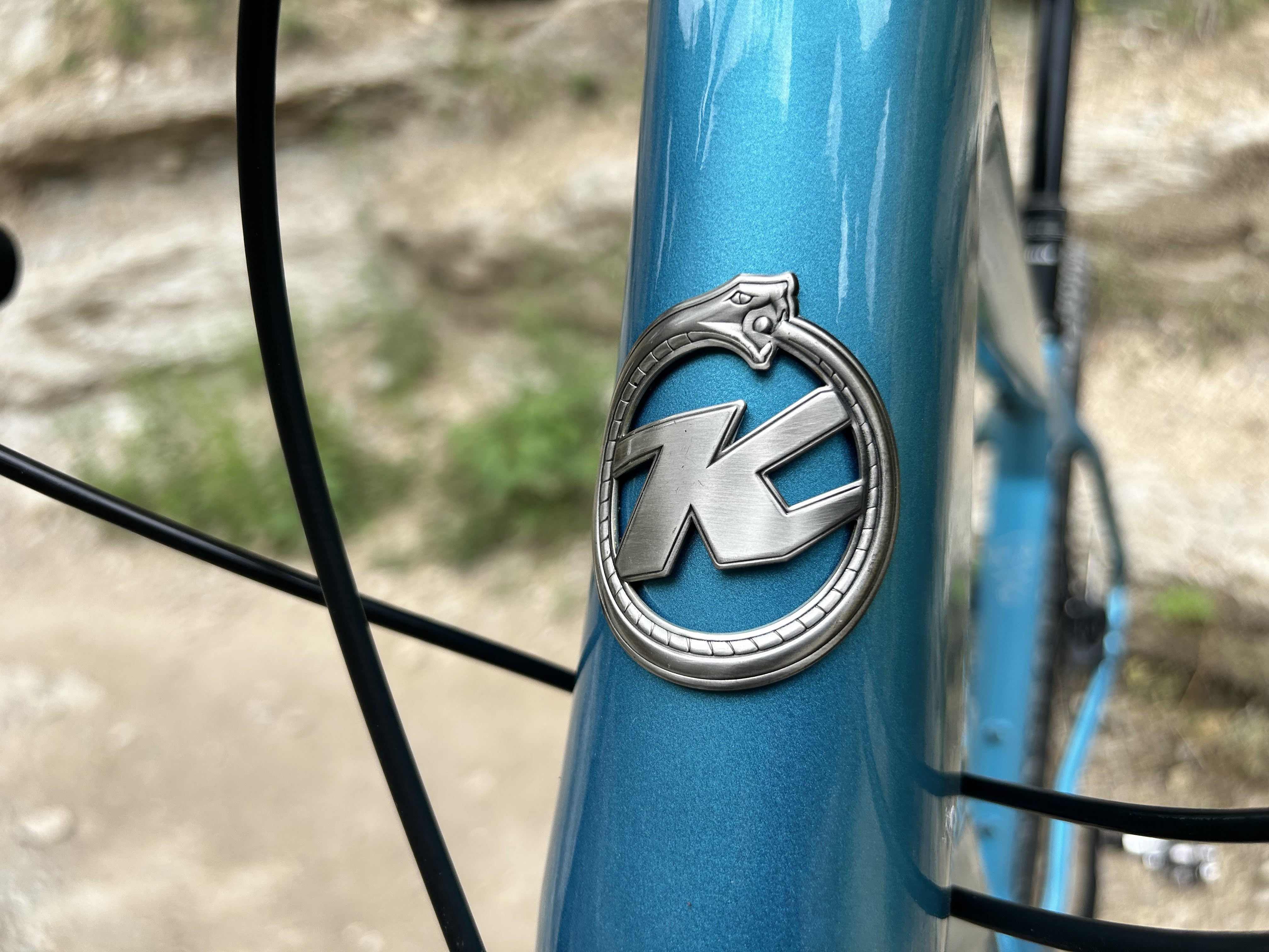 Kona Ouroboros from logo detail image,
