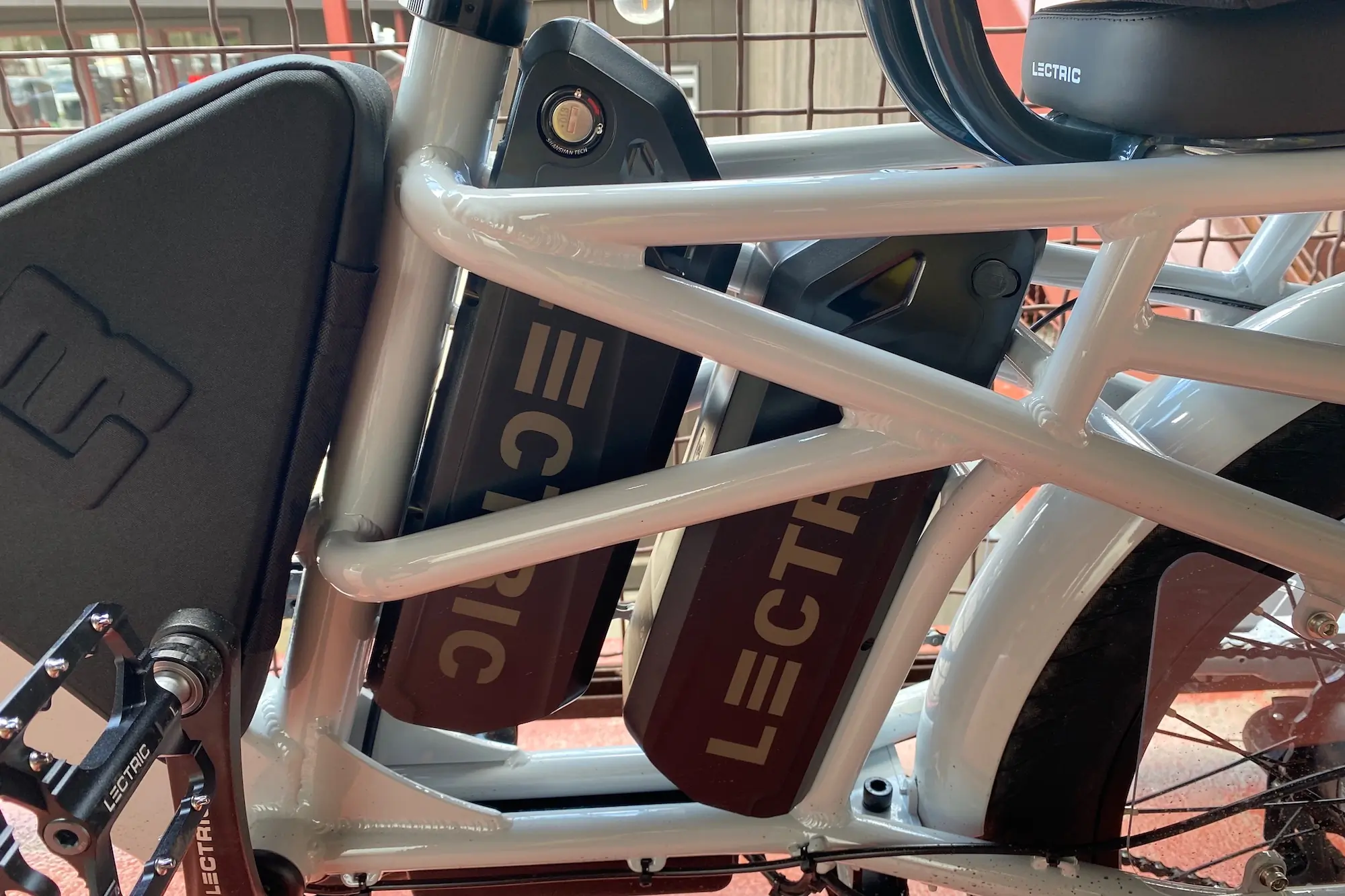 The dual batteries on the Lectric Xpedition electric cargo bike