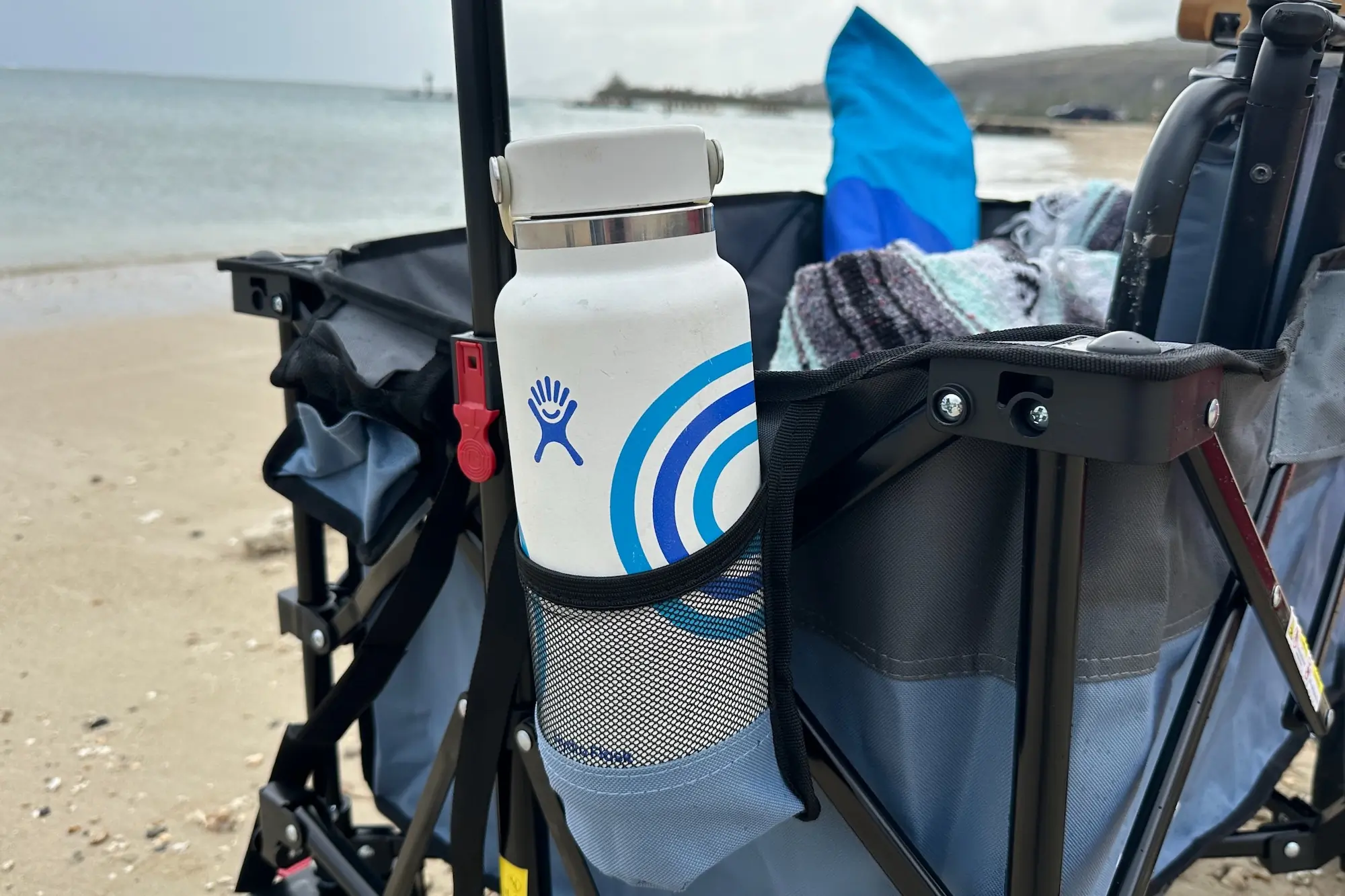 A look at a water bottle pocket on a beach wagon