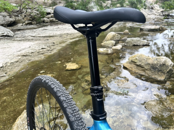 Kona Ouroboros dropper seat post detail photo.