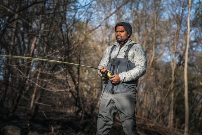 man fishing in patagonia winter fly fishing gear