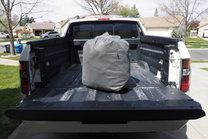 car blanket in a carry case in a truck bed 