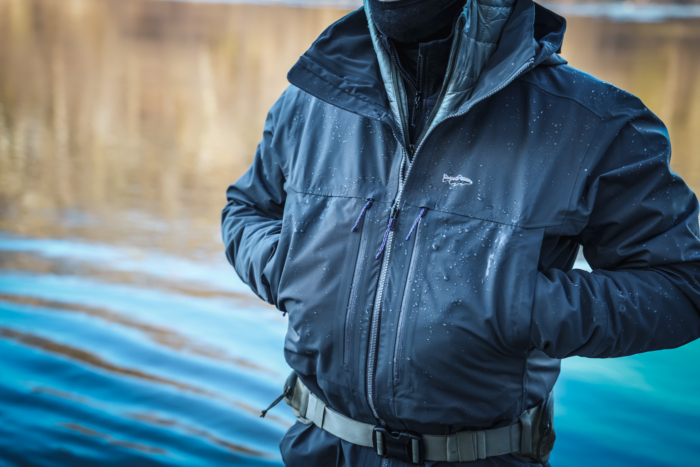 man wearing patagonia swiftcurrent wading jacket