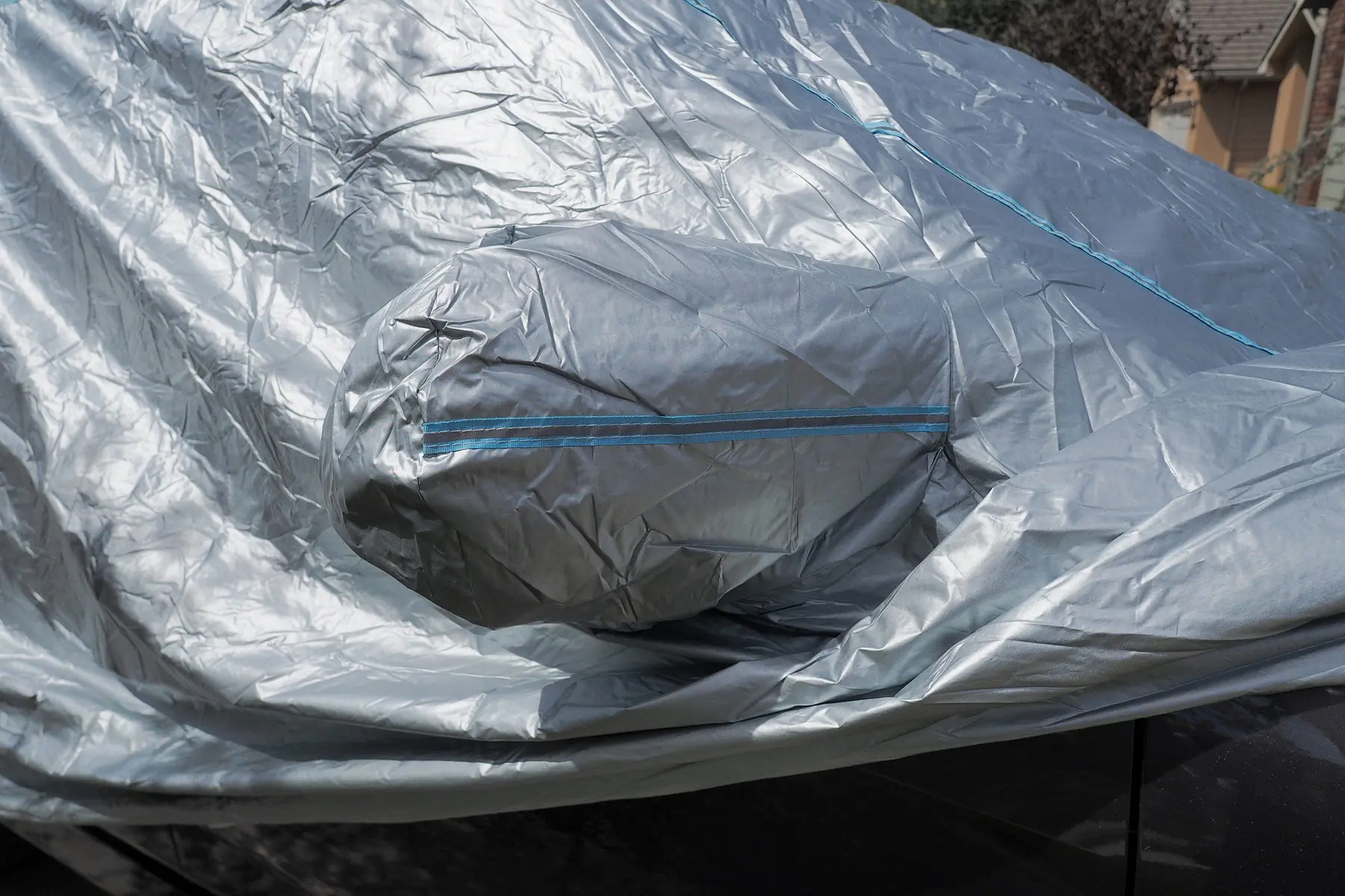 car blanket on rearview mirror with reflector