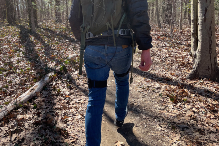 a man wearing x1 on the trail