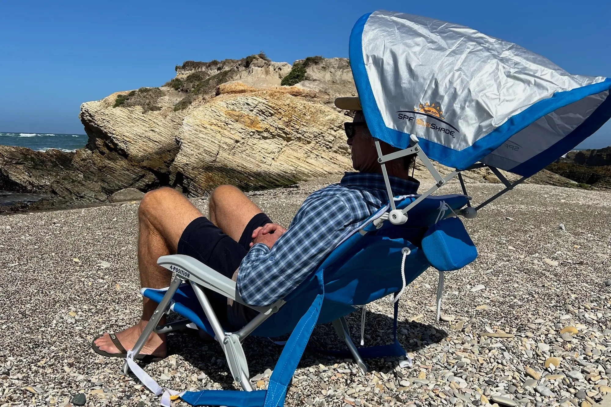 Reclining in the 4-position adjustable GCI Outdoor Backpack Beach Chair