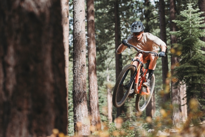 jumping on a bike wearing the Mallet Trail Boa shoes