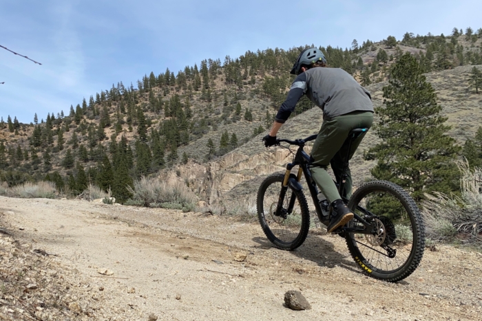 riding up a dirt road in the Mallet Trail BOA shoes