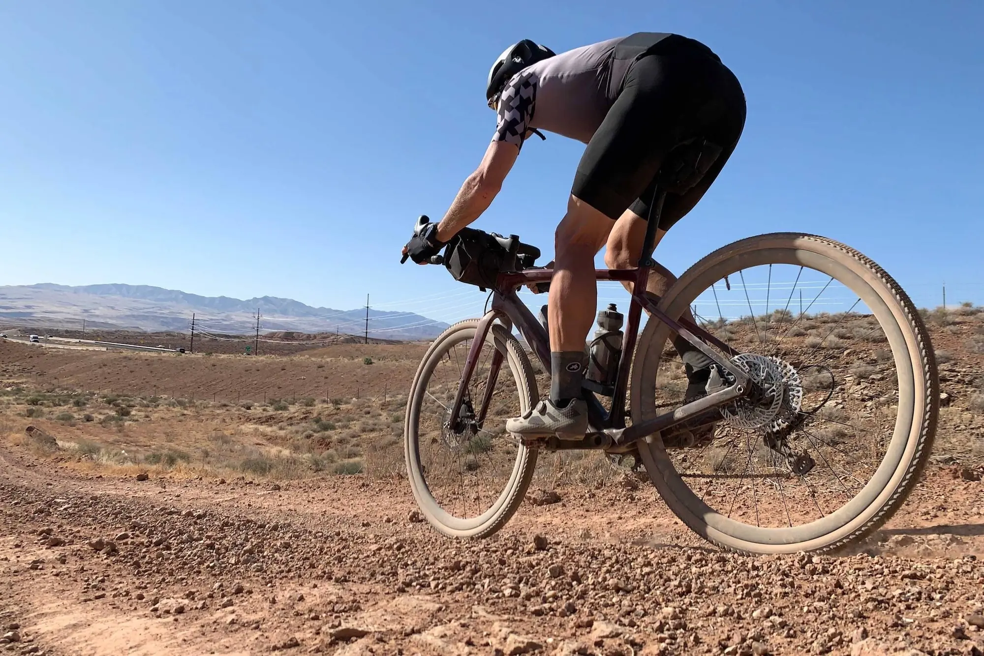 Riding a gravel bike in the desert wearing cycling bib shorts