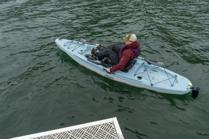 paddling a fishing kayak with a rudder, which makes steering much easier