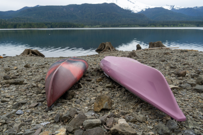 two upside down kayaks show the different hull shapes that effect their paddling