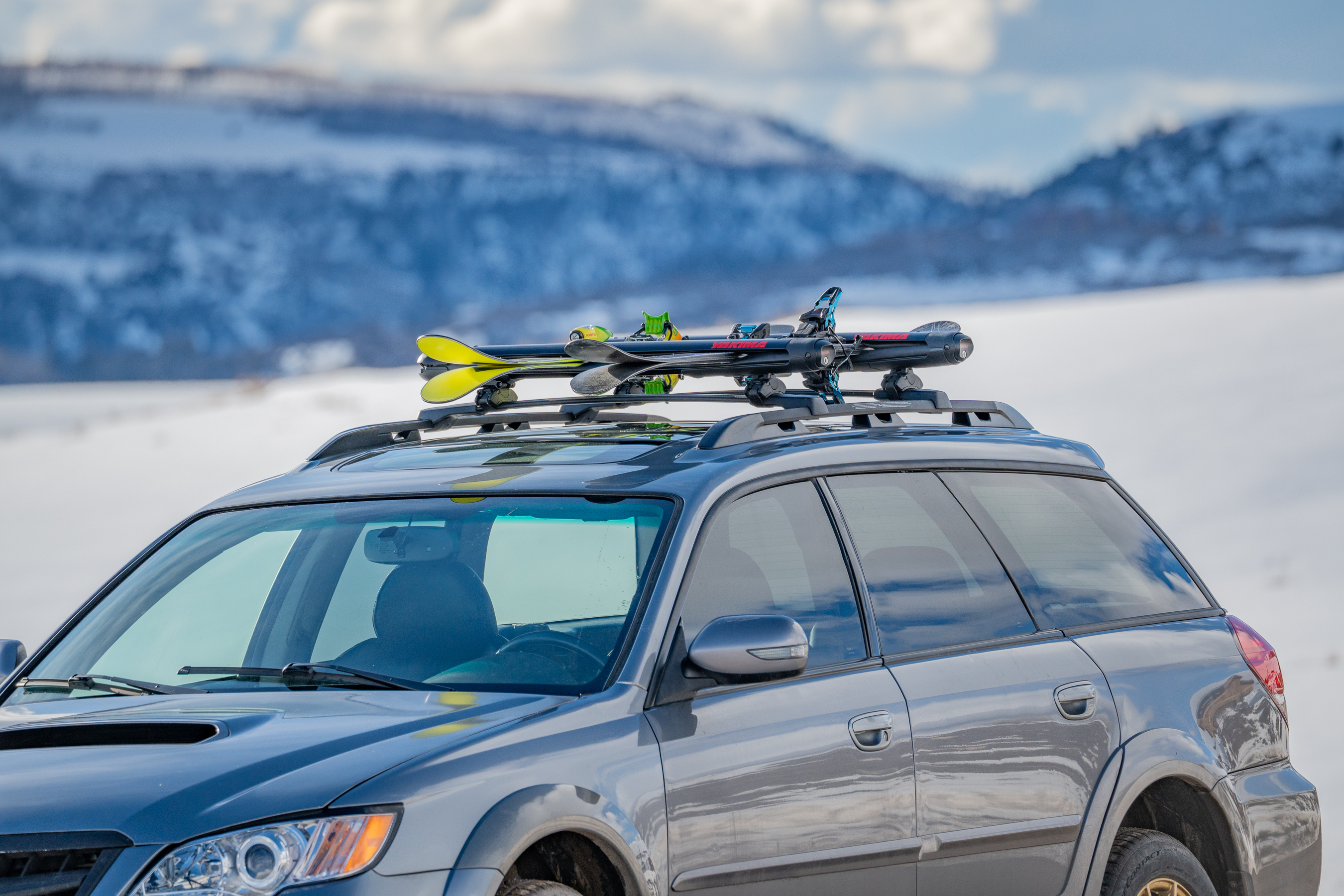loaded ski roof rack on Subaru Outback 