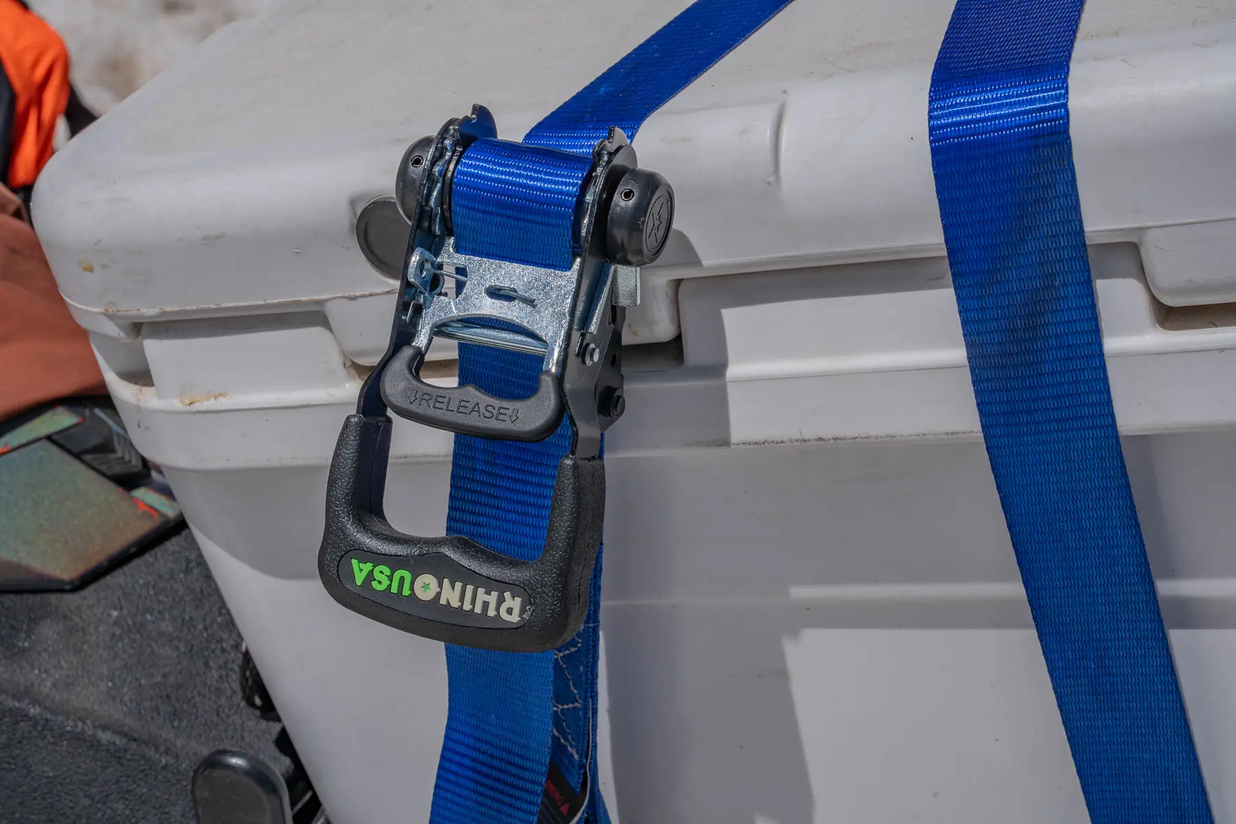 labeled release arm on a ratchet strap 
