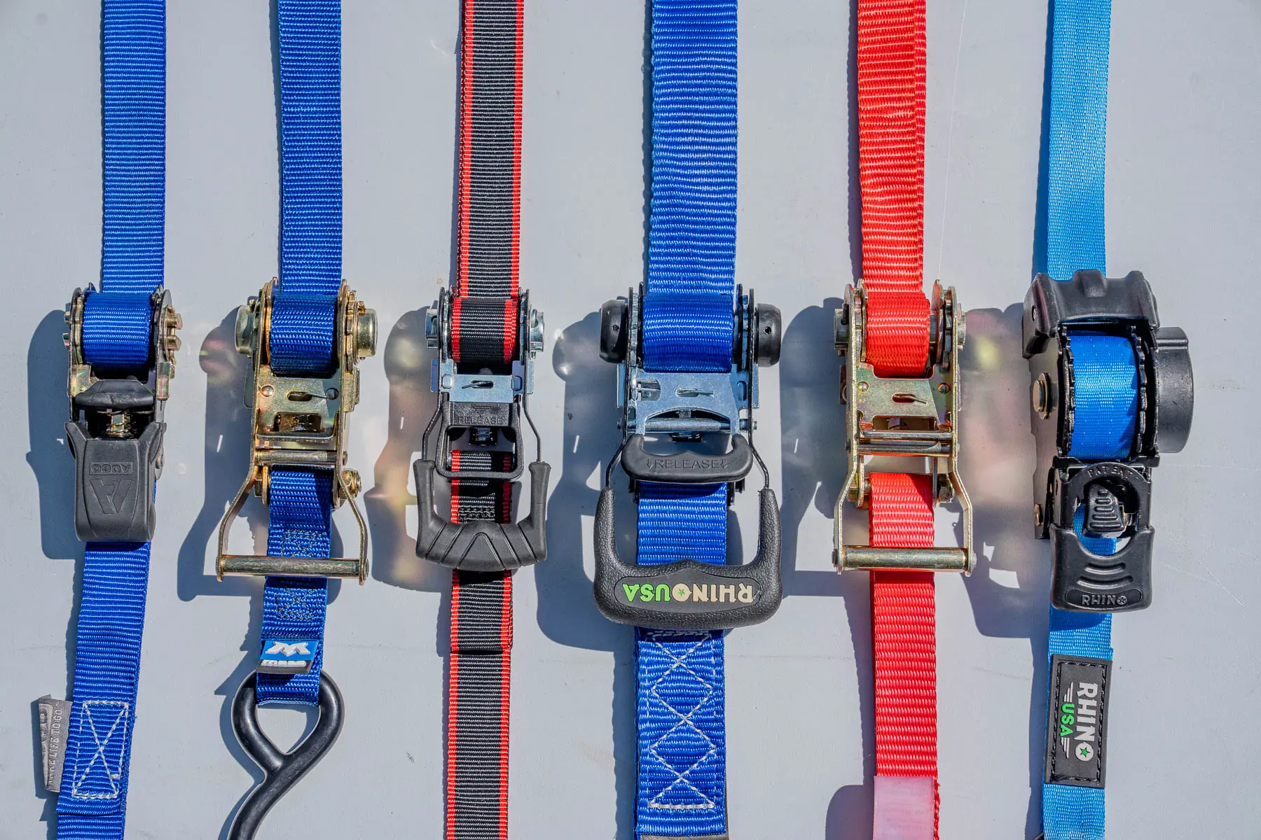 a lineup of ratchet straps 