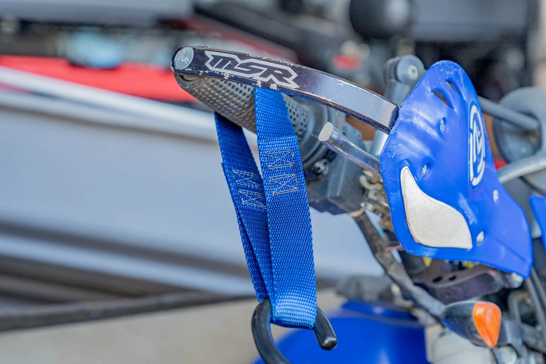 shackle around a dirt bike handle 