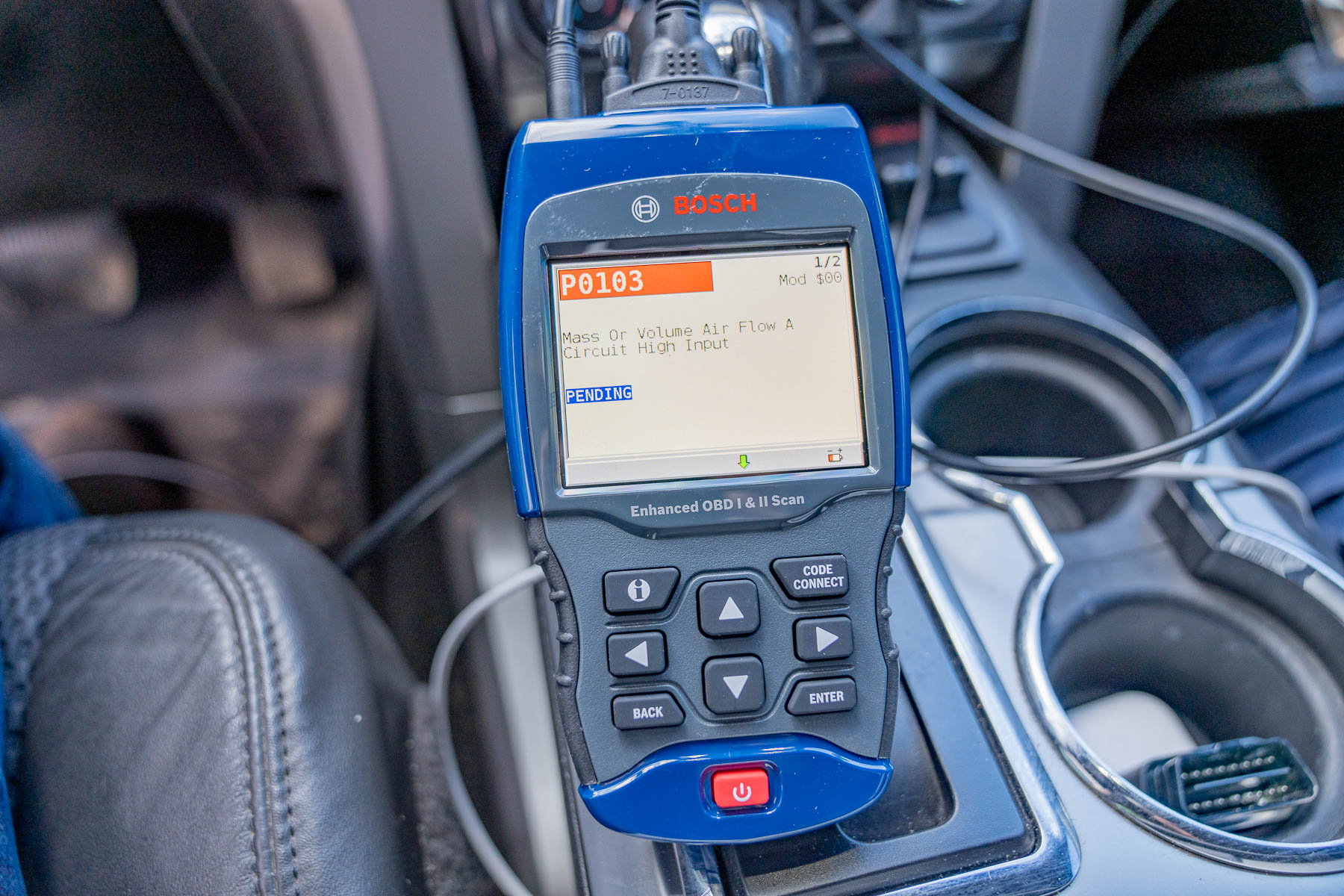Bosch 1300 OBD scanner in vehicle