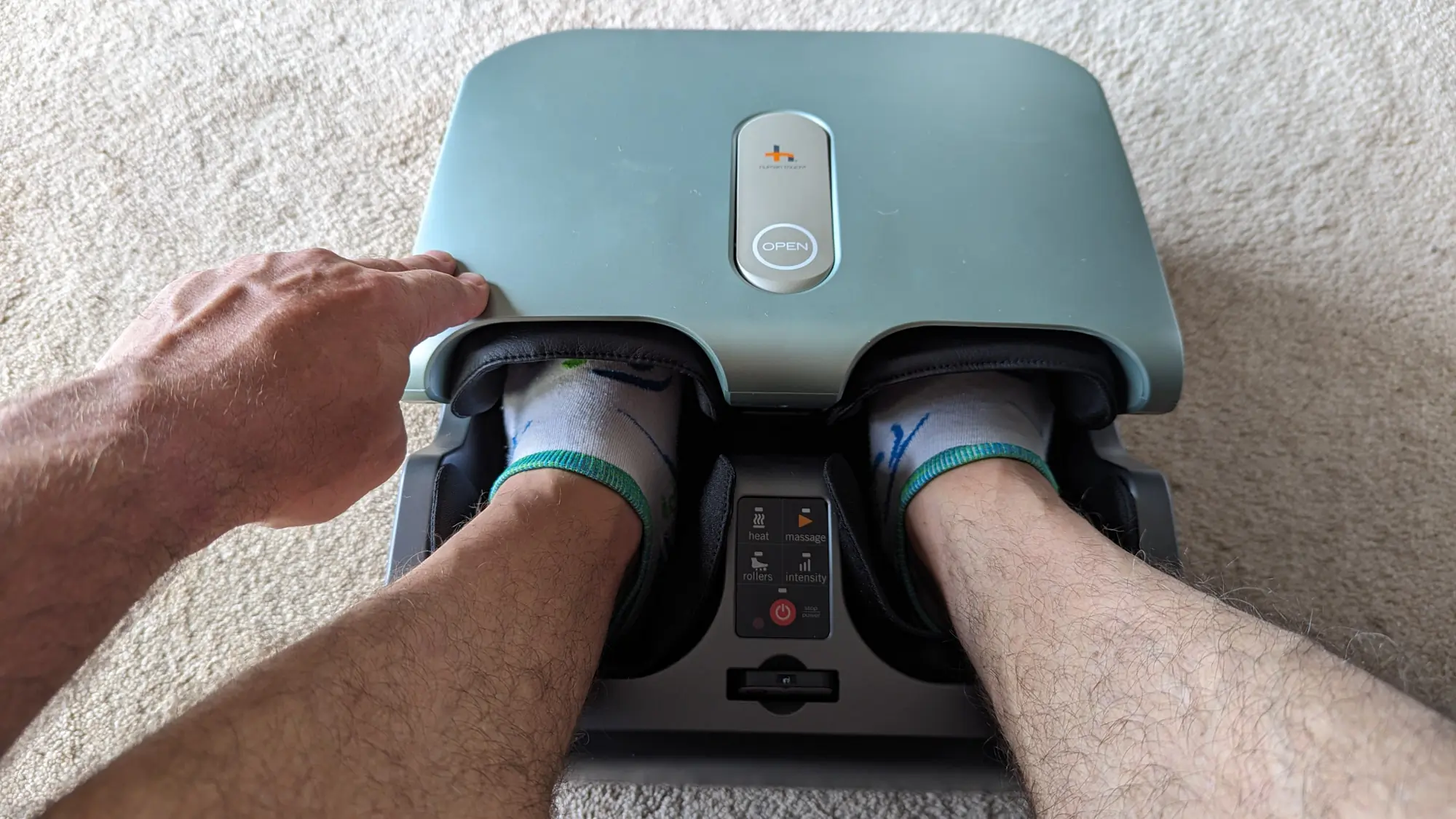 Close the lid of the Humantouch Reflex PopUp to fully surround your feet in rolling and compression; (photo/Scott Tharler)