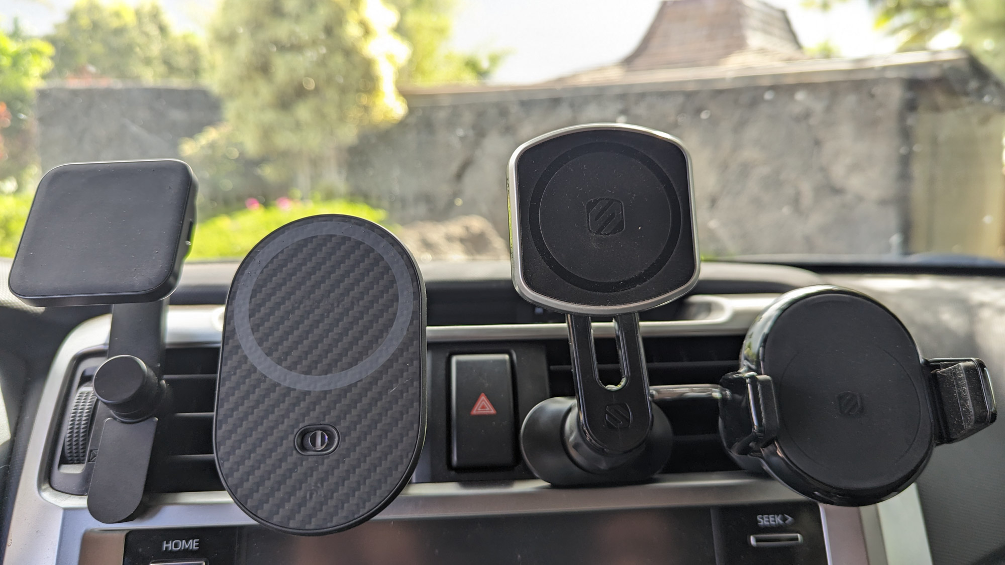 Gear Junkie - Best Car Phone Mounts - PD Pitaka Scosche mounts on a car vent