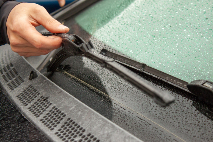 lifting wiper blades from a wet window