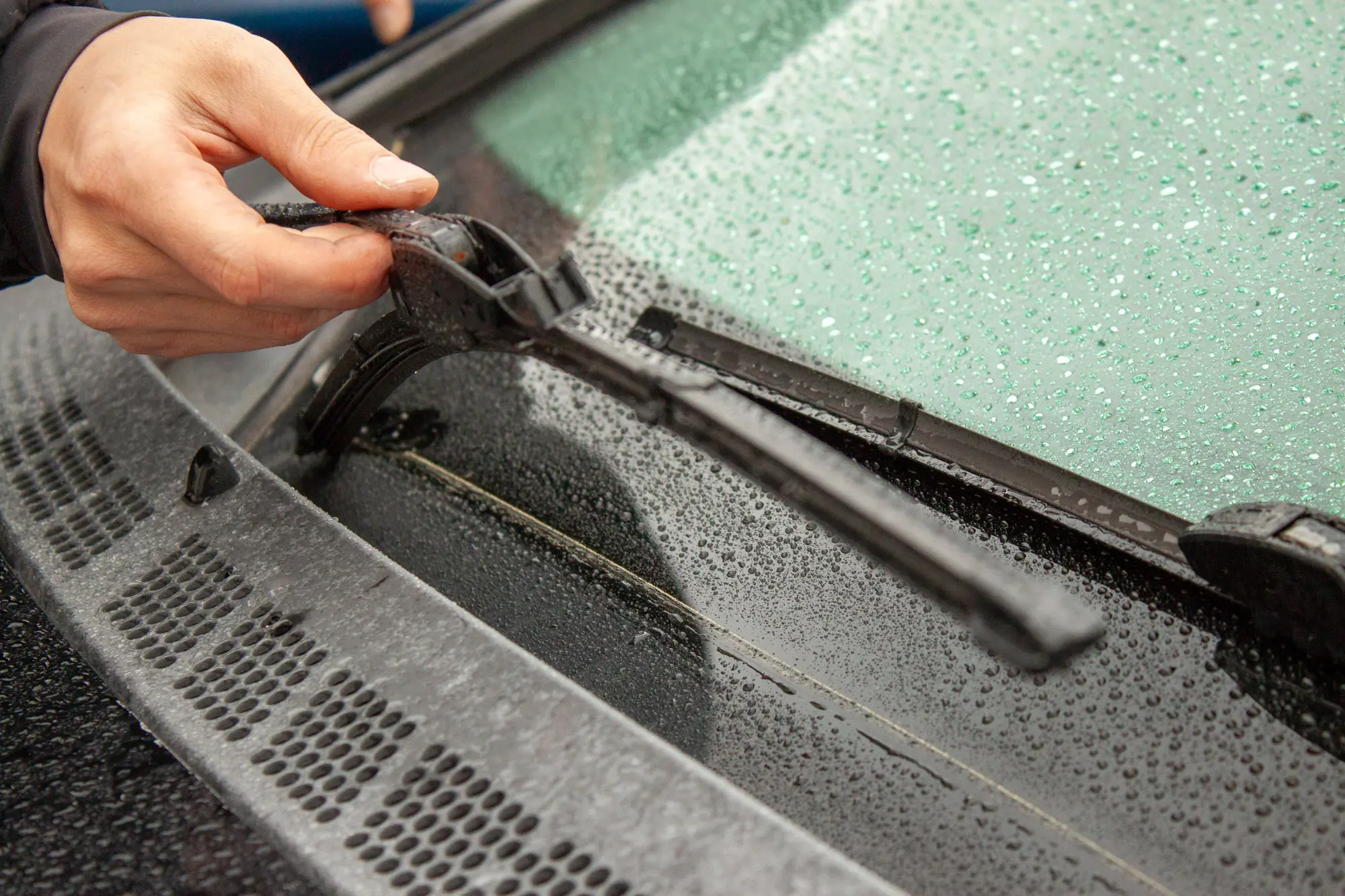 lifting wiper blades from a wet window