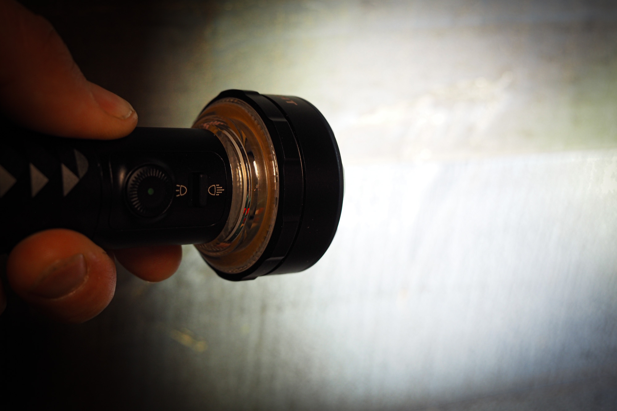 Olight Prowess flashlight, lantern with charging base