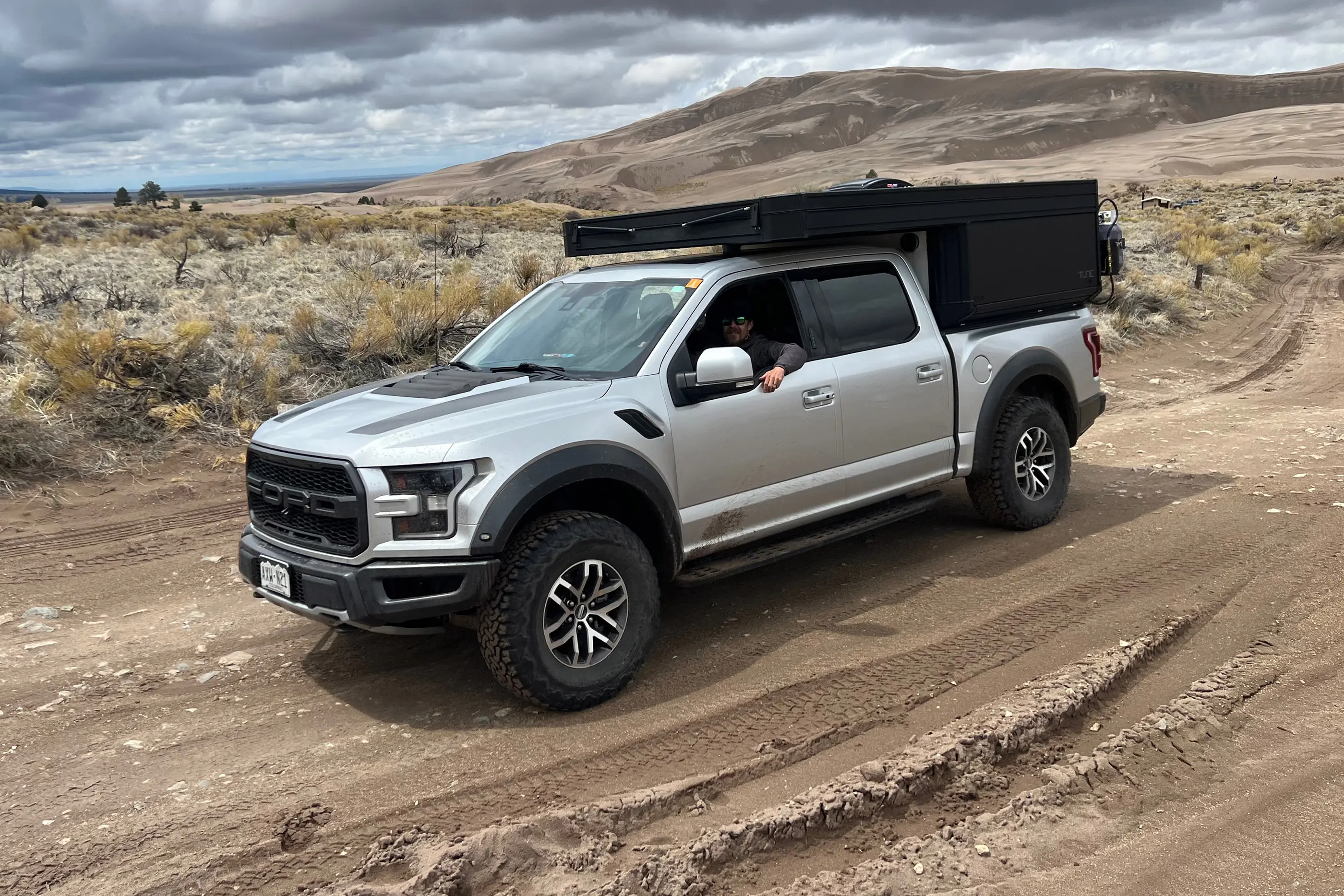 TUNE M1 camper on driving Ford Raptor