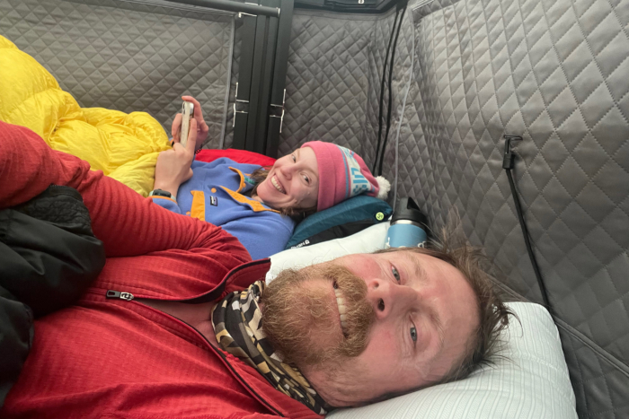 Two people napping in the TUNE M1 camper