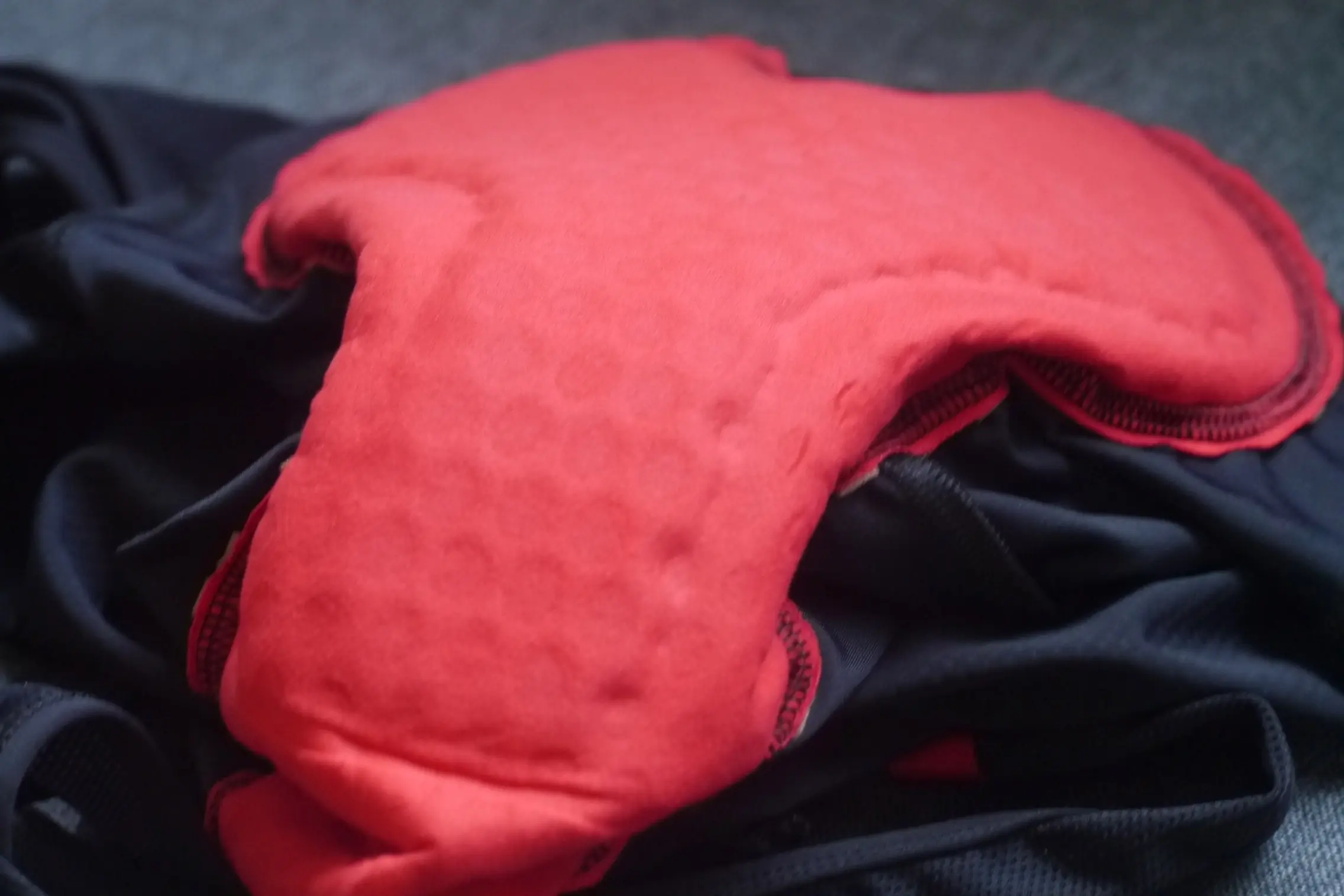 A pad, or chamois, on a pair of men's cycling bibs