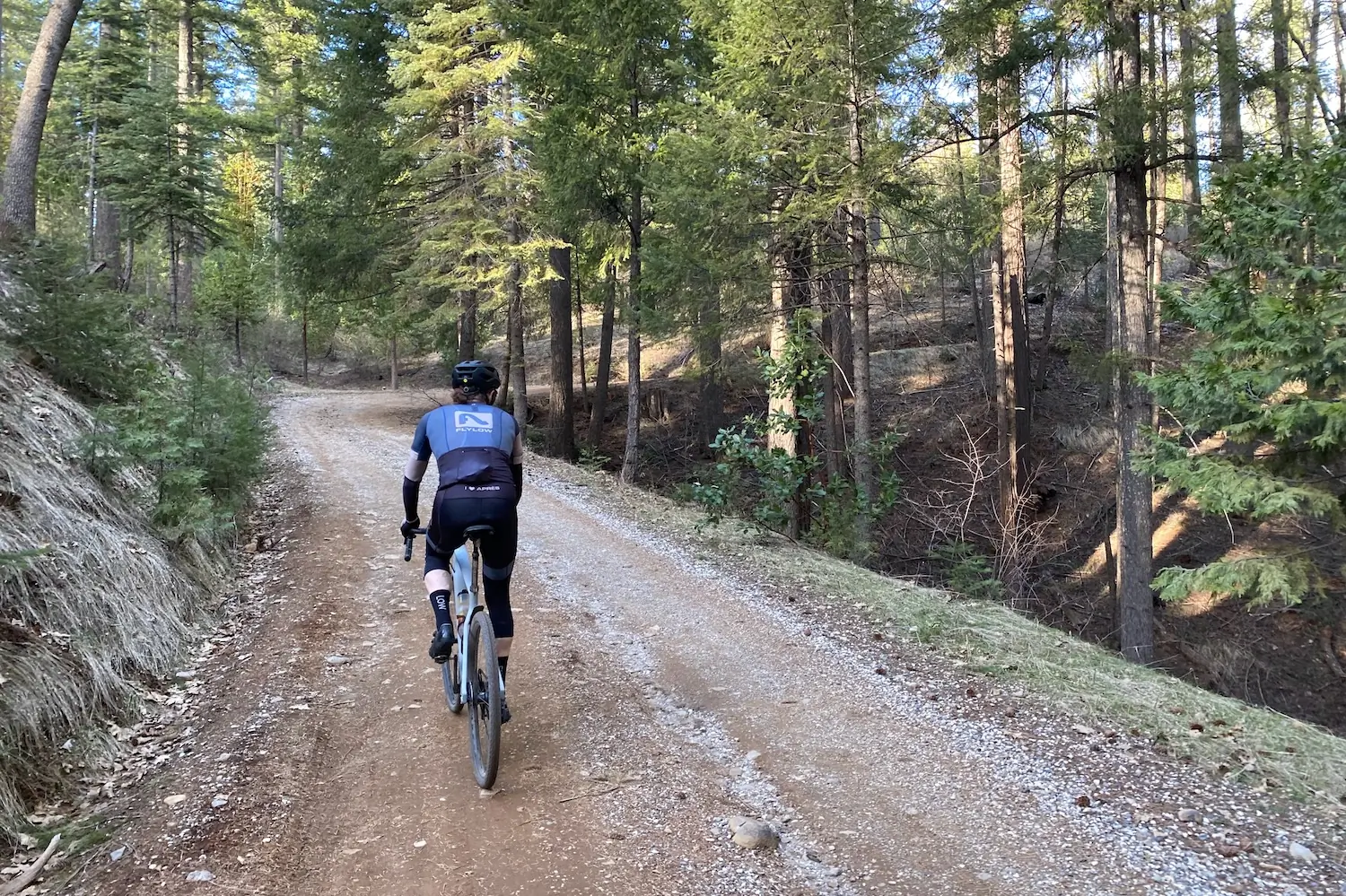 Climbing up a gravel road while testing the YT Szepter gravel bike