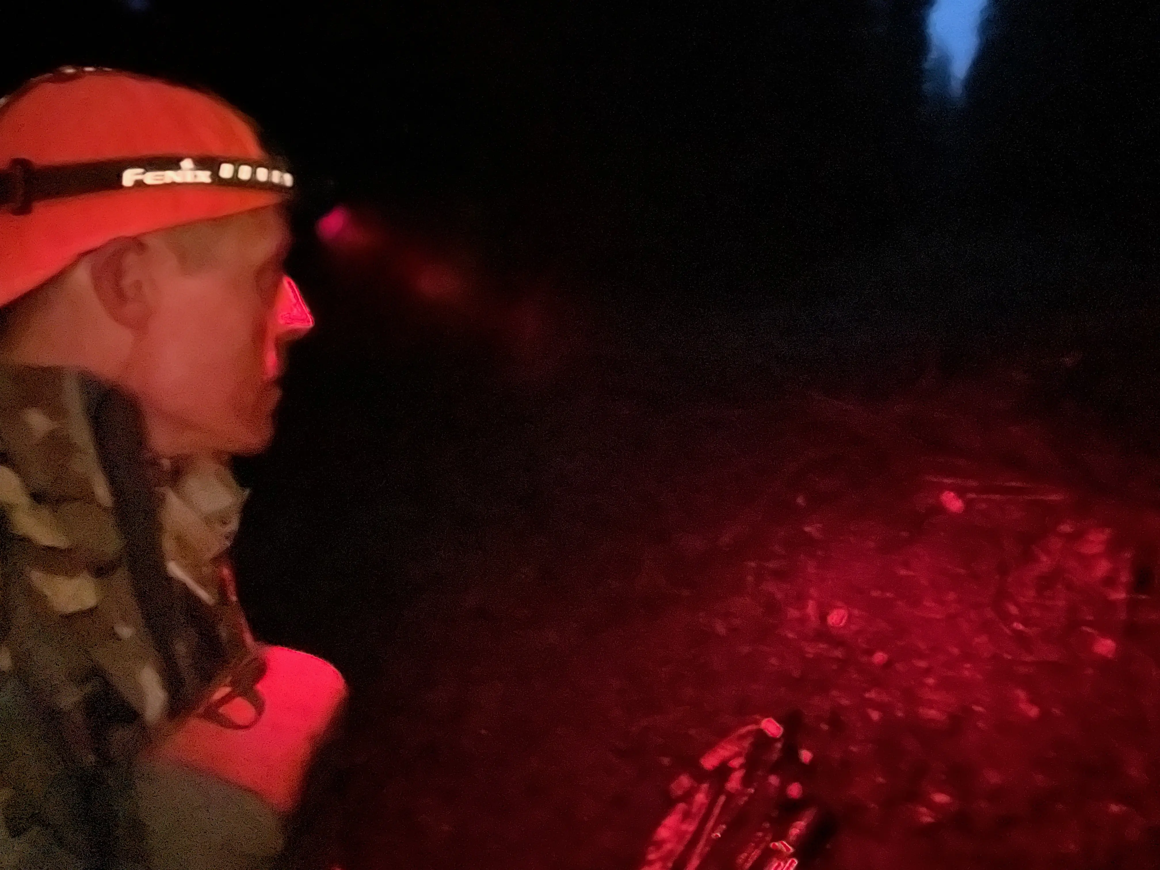 Sean McCoy using a headlamp with red light after a hunt
