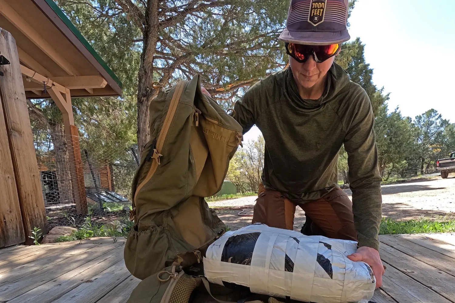 Putting sandbag in the kuiu pack