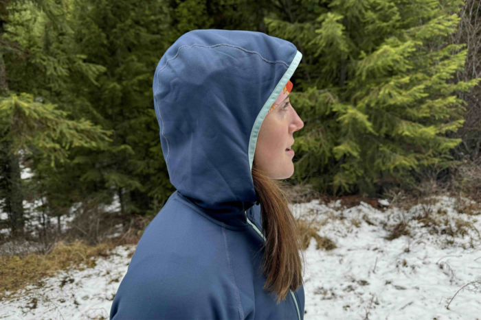 woman wearing rei co-op flash hyperstretch fleece jacket