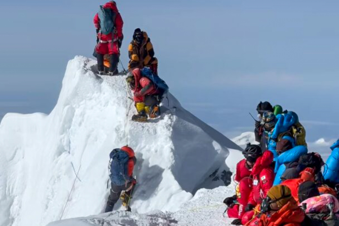 Climber climbing to safety after May 21, 2024 cornice collapse on Mt. Everest