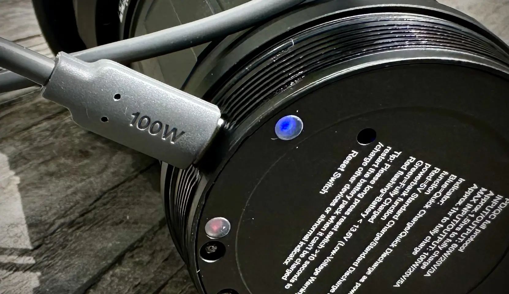 Charging the Acebeam X75 with the 100W cable plugged in