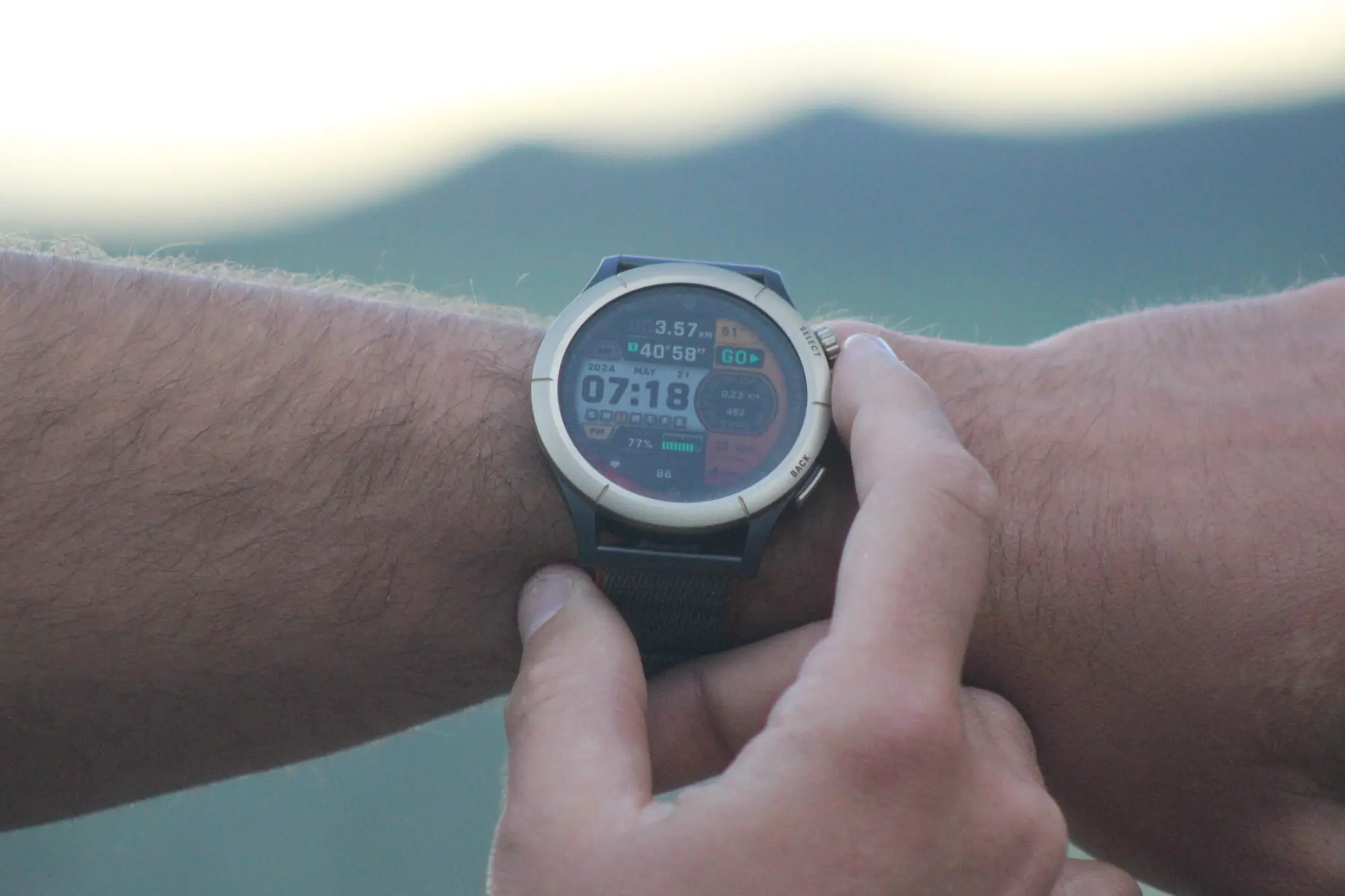 The Amazfit Cheetah Pro watch being adjusted on wrist