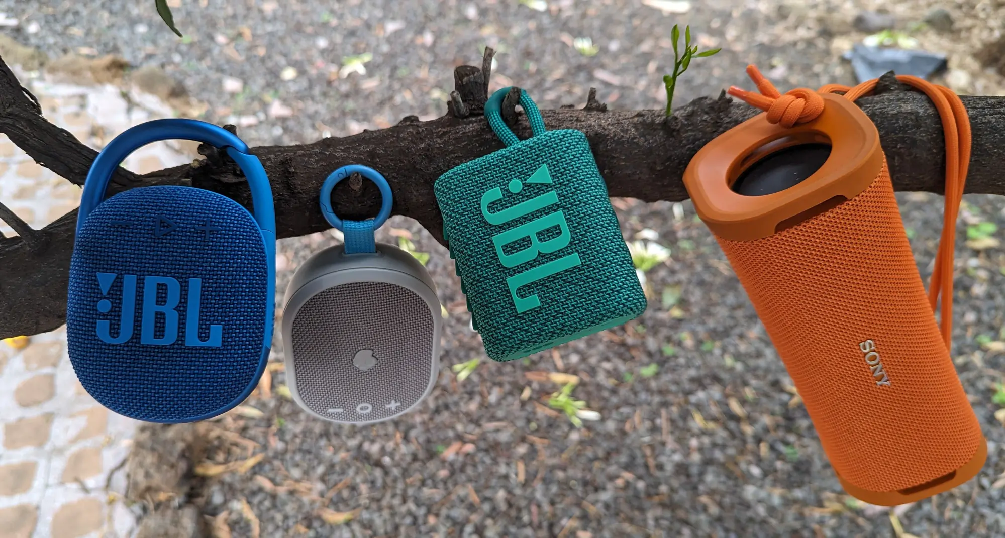 Gear Junkie - Best Portable Bluetooth Speaker - Group of small speakers hanging from a tree