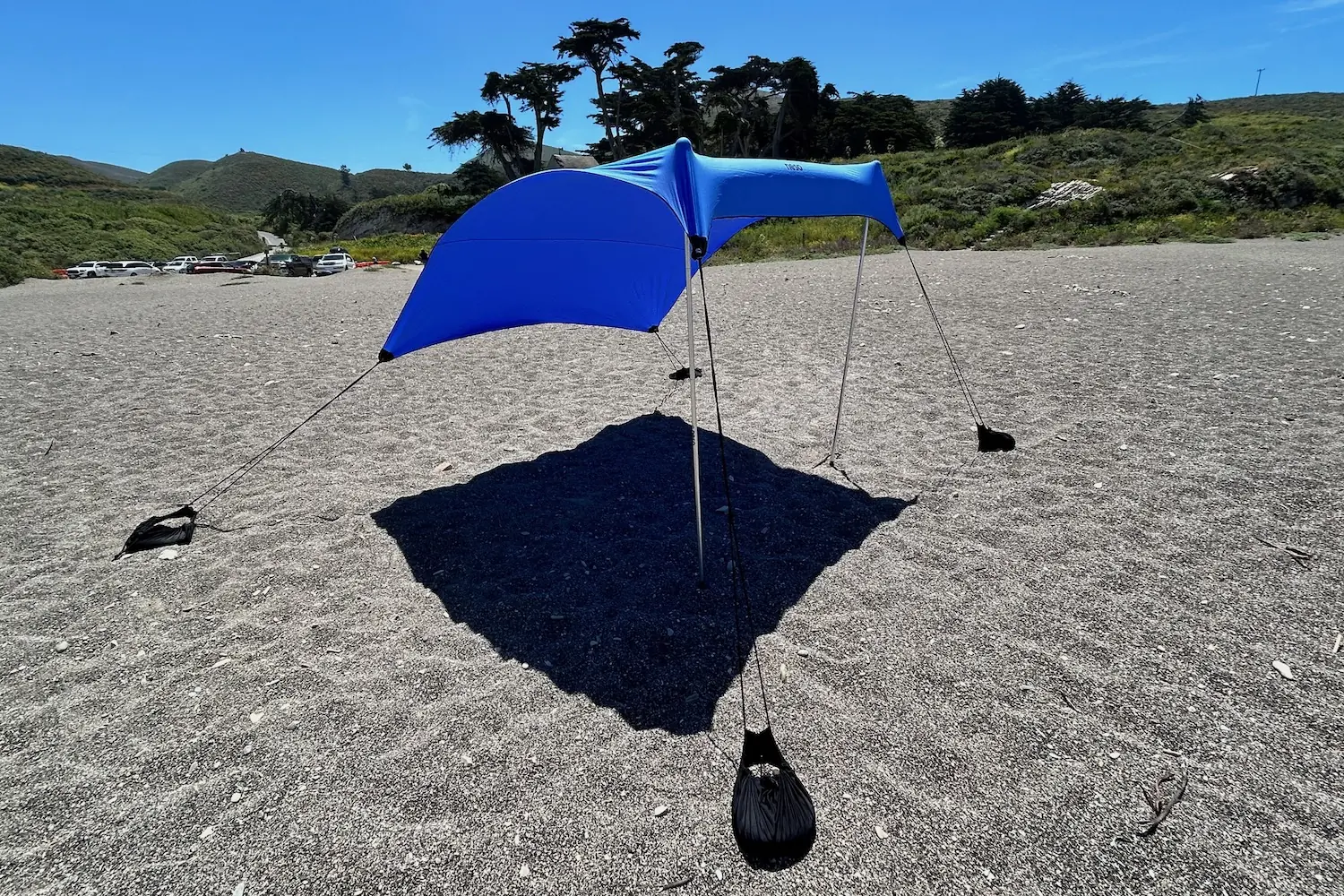 Looking onshore at the Neso 1 beach tent being buffetted by a consitent, light, onshore breeze