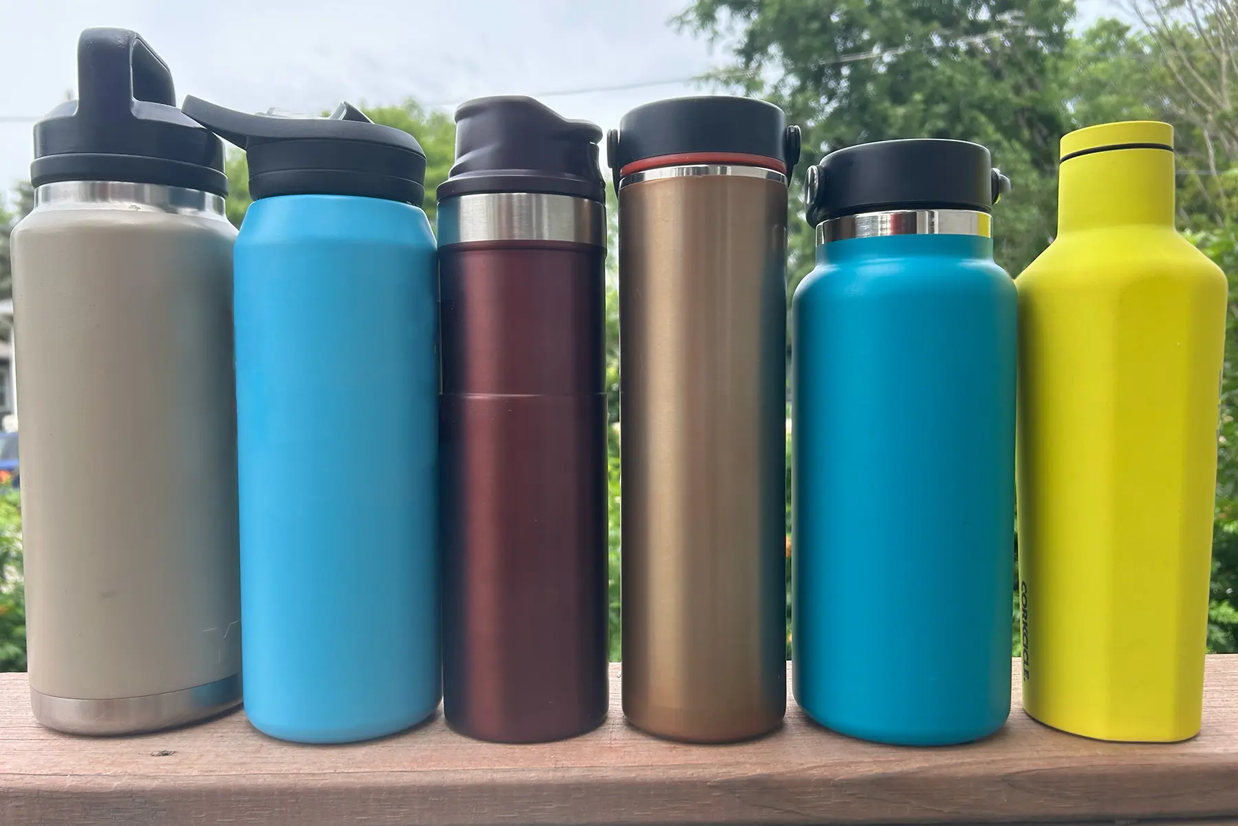 lineup of colorful water bottles