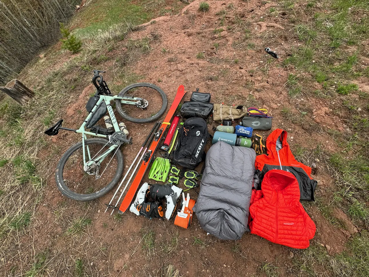 laid out overnight gear for a bike to ski adventure, showcasing all the essential equipment