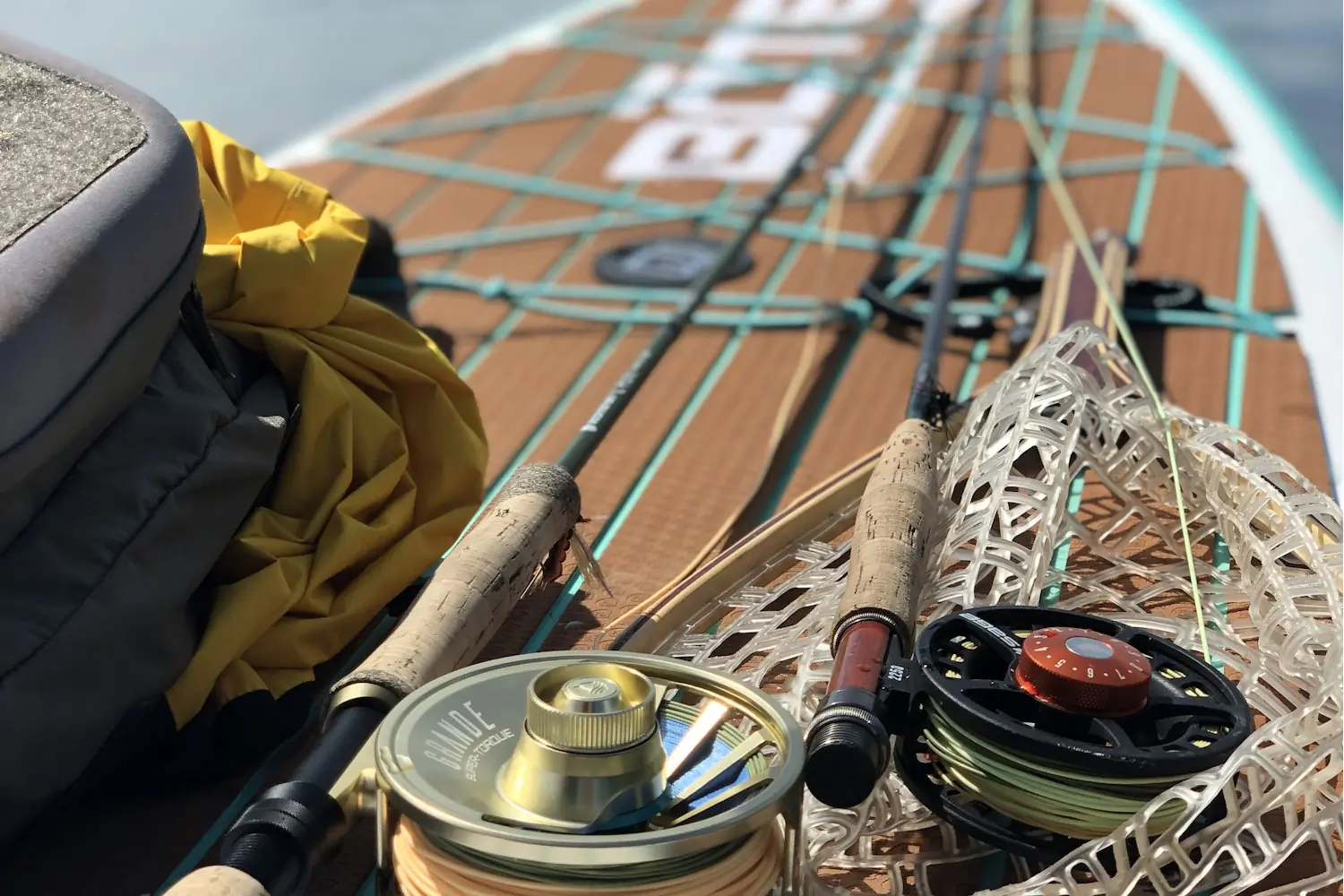 paddleboard equipped with fishing gear