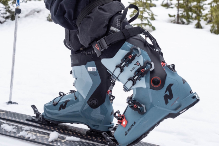 Skier wearing Nordica VLT 130 LT ski boots