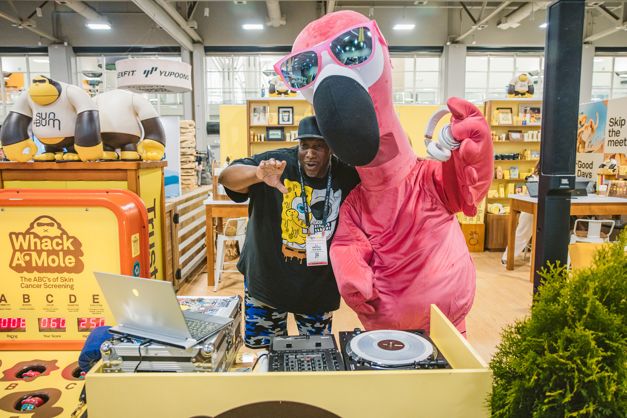 sun bum dj with flamingo at outdoor retailer