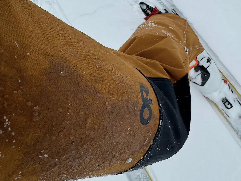 Close-up wet tops of thighs on outdoor research cirque III softshell pants