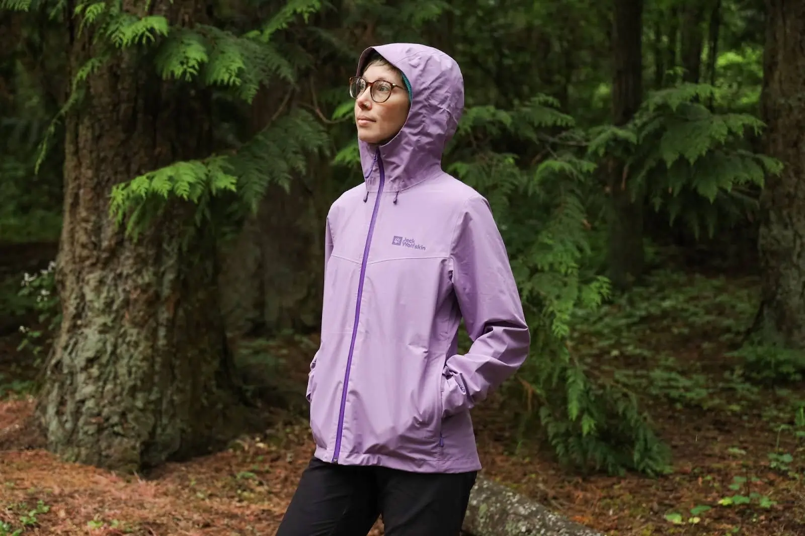woman wearing jack wolfskin highest peak 3l jacket