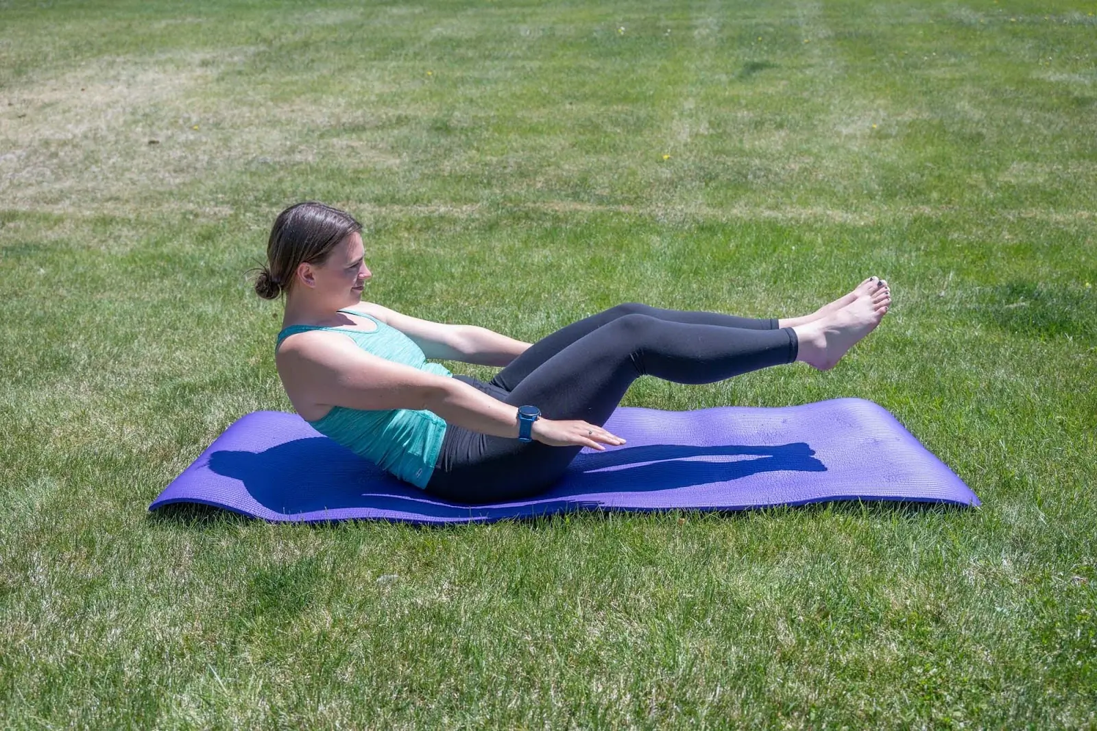 woman working out in prana chakara 7/8 leggings